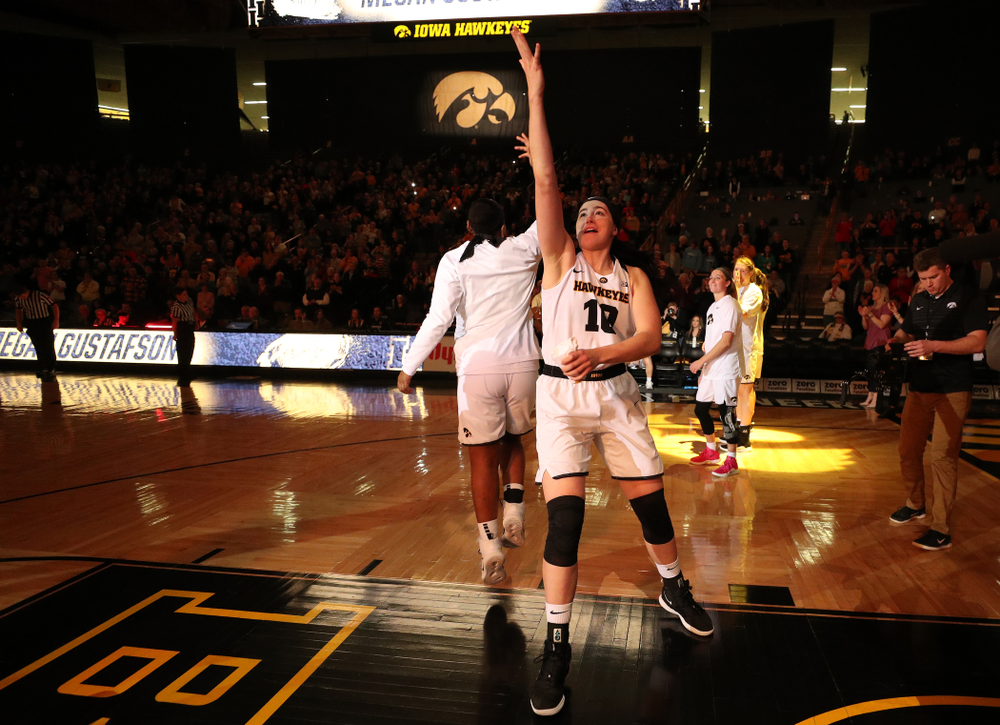 Iowa Hawkeyes forward Megan Gustafson (10) and guard Zion Sanders (24) against the Illinois Fighting Illini Thursday, February 14, 2019 at Carver-Hawkeye Arena. (Brian Ray/hawkeyesports.com)