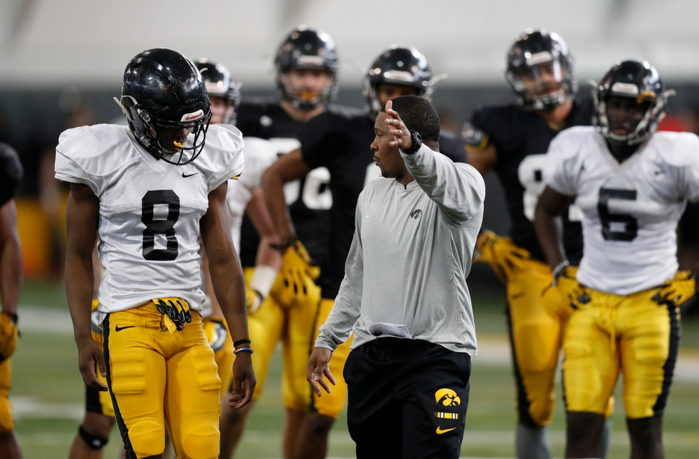 Iowa Hawkeyes defensive back Matt Hankins (8) and running backs coach Derrick Foster during spring practice Thursday, March 29, 2018 at the Hansen Football Performance Center. (Brian Ray/hawkeyesports.com)