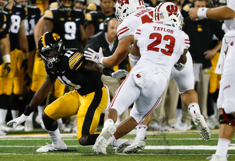 Iowa Hawkeyes defensive back Michael Ojemudia (11) holds the edge during a game against Wisconsin at Kinnick Stadium on September 22, 2018. (Tork Mason/hawkeyesports.com)