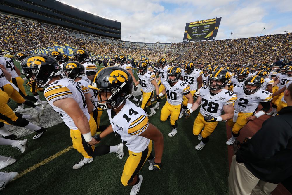 The Iowa Hawkeyes swarm on to the field for their game against the Michigan Wolverines Saturday, October 5, 2019 at Michigan Stadium in Ann Arbor, MI. (Brian Ray/hawkeyesports.com)