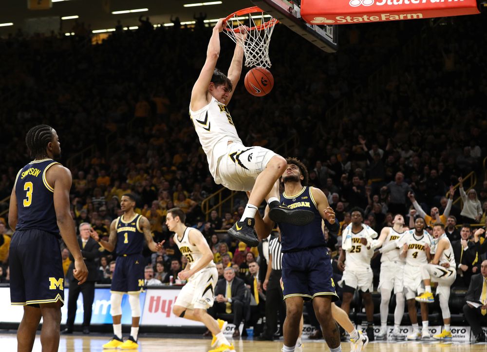 Iowa Hawkeyes forward Luka Garza (55) dunks the ball against the Michigan Wolverines Friday, February 1, 2019 at Carver-Hawkeye Arena. (Brian Ray/hawkeyesports.com)