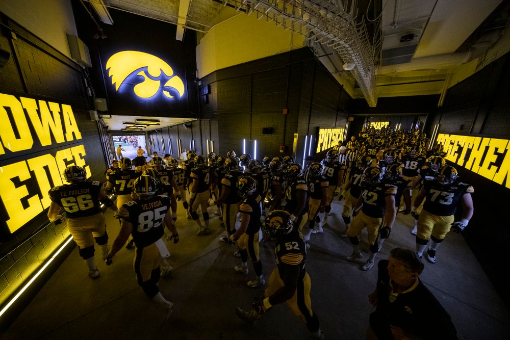 The Iowa Hawkeyes take the field in their new home tunnel before their game against the Miami RedHawks Saturday, August 31, 2019 at Kinnick Stadium in Iowa City. (Brian Ray/hawkeyesports.com)