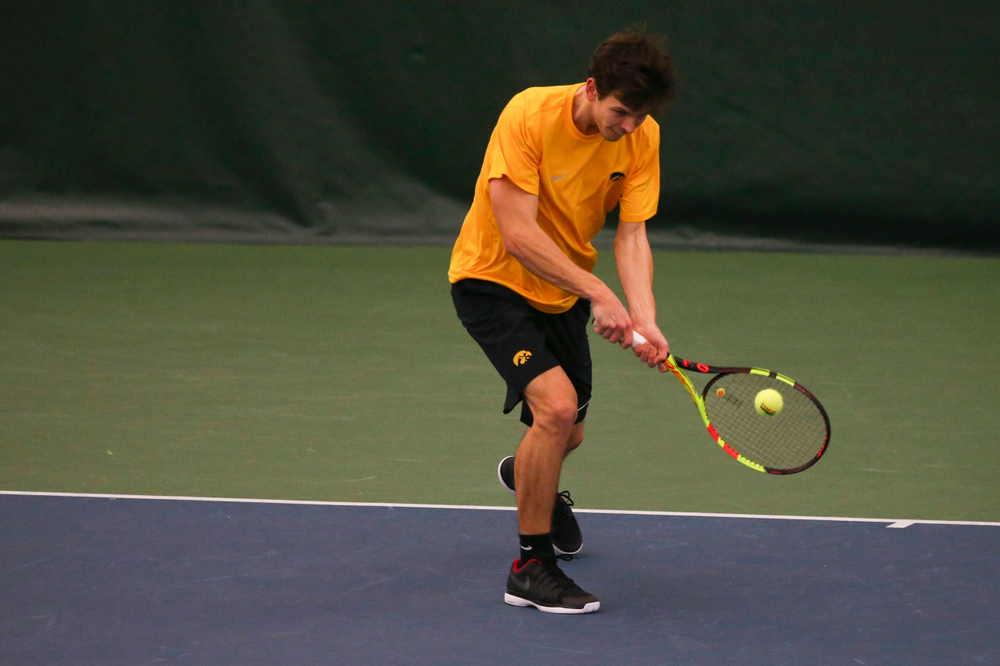 Iowa's Joe Tyler at a tennis match vs Drake Friday, March 8, 2019 at the Hawkeye Tennis and Recreation Complex. (Lily Smith/hawkeyesports.com)