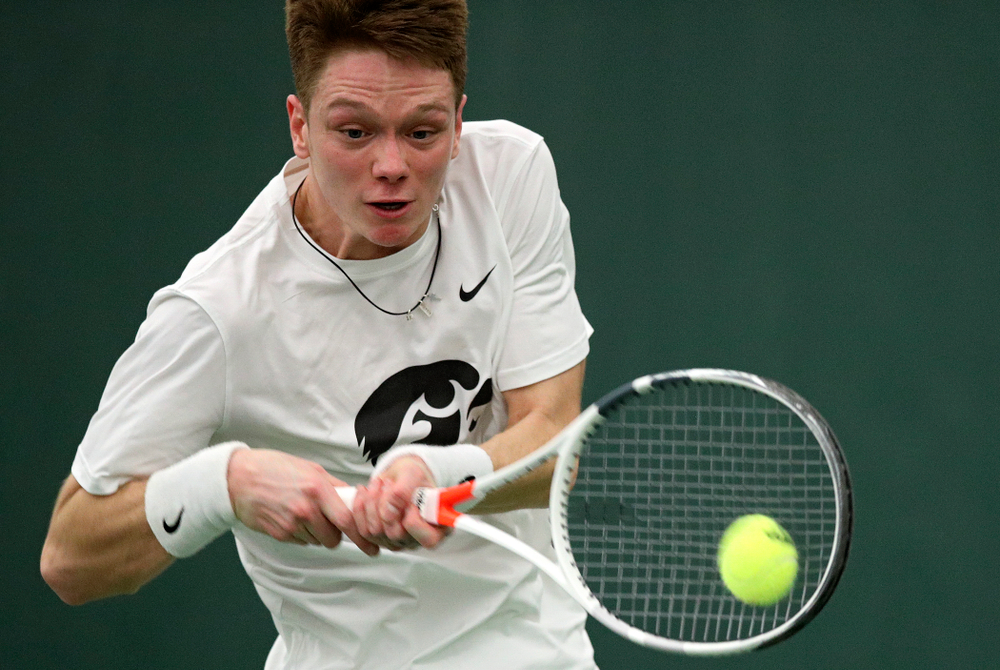 Iowa’s Jason Kerst returns a shot during his singles match at the Hawkeye Tennis and Recreation Complex in Iowa City on Sunday, February 16, 2020. (Stephen Mally/hawkeyesports.com)