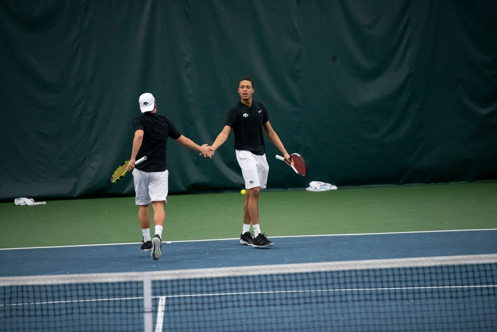 The Iowa men's tennis team competes against Cornell in The Rise Tennis Center in Ithaca, NY on Sunday, Feb. 24, 2019.