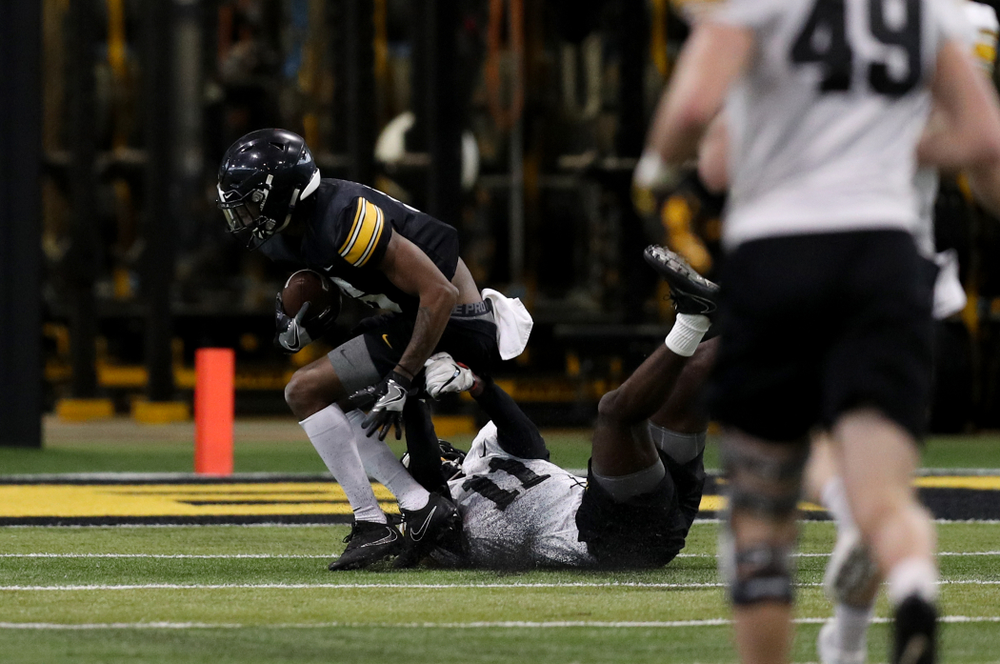 Iowa Hawkeyes wide receiver Ihmir Smith-Marsette (6) and defensive back Michael Ojemudia (11) during practice Wednesday, December 12, 2018 at the Hansen Football Performance Center in preparation for the Outback Bowl game against Mississippi State. (Brian Ray/hawkeyesports.com)