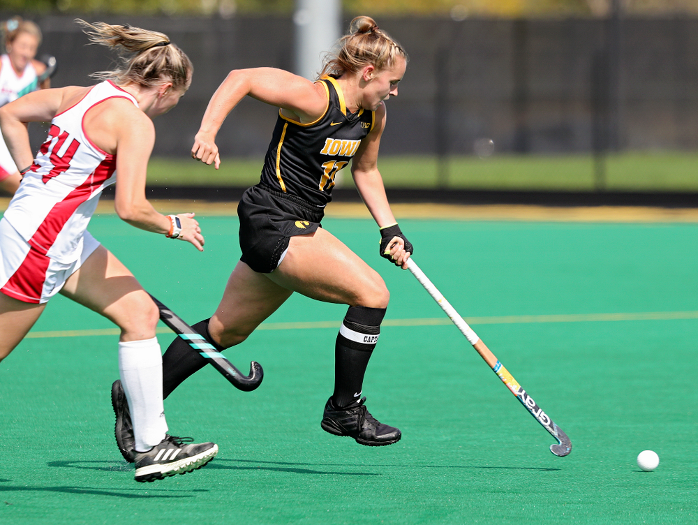 Iowa’s Katie Birch (11) sprints with the ball during the first quarter of their match at Grant Field in Iowa City on Friday, Oct 4, 2019. (Stephen Mally/hawkeyesports.com)