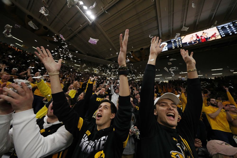 The Hawks Nest throws paper in the air after the Iowa Hawkeyes first basket against the Nebraska Cornhuskers Saturday, February 8, 2020 at Carver-Hawkeye Arena. (Brian Ray/hawkeyesports.com)
