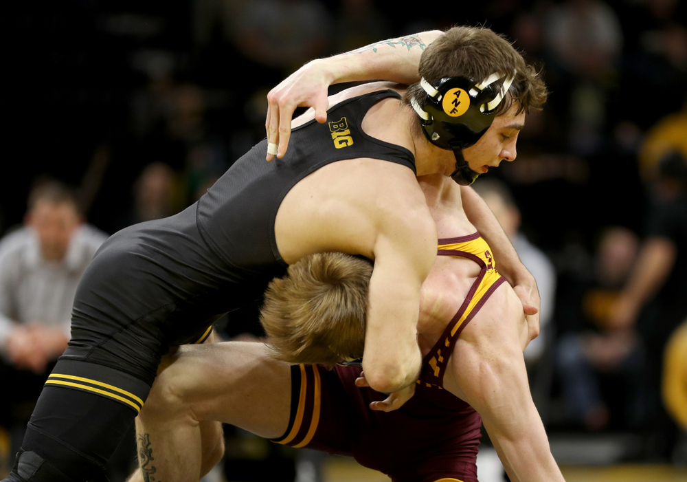 Iowa’s Austin DeSanto wrestles Minnesota’s Boo Dryden at 133 pounds Saturday, February 15, 2020 at Carver-Hawkeye Arena. DeSanto won the match 24-8. (Brian Ray/hawkeyesports.com)