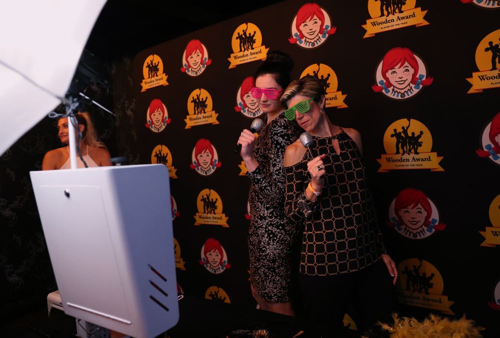 Iowa Hawkeyes forward Megan Gustafson (10) and associate head coach Jan Jensen in the photo booth at the after party for the ESPN College Basketball Awards show Friday, April 12, 2019 at The Novo at LA Live. (Brian Ray/hawkeyesports.com)