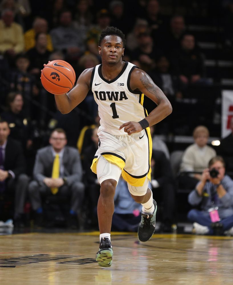 Iowa Hawkeyes guard Joe Toussaint (1) against the Ohio State Buckeyes Thursday, February 20, 2020 at Carver-Hawkeye Arena. (Brian Ray/hawkeyesports.com)