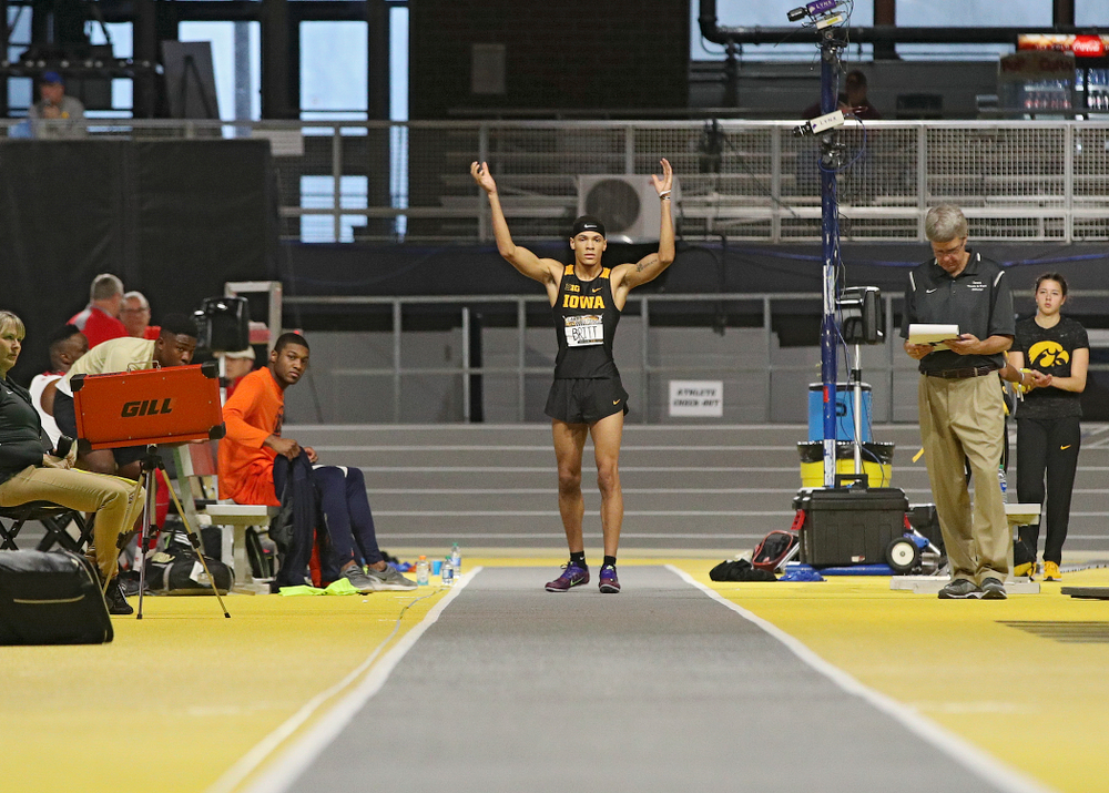 Iowa’s Jamal Britt gets the crowd to clap before his final jump in the men’s long jump event during the Larry Wieczorek Invitational at the Recreation Building in Iowa City on Friday, January 17, 2020. (Stephen Mally/hawkeyesports.com)