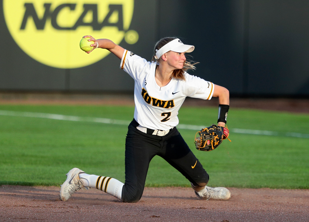 Iowa second baseman Aralee Bogar (2) throws to first base for an out during the seventh inning of their game against Ohio State at Pearl Field in Iowa City on Friday, May. 3, 2019. (Stephen Mally/hawkeyesports.com)