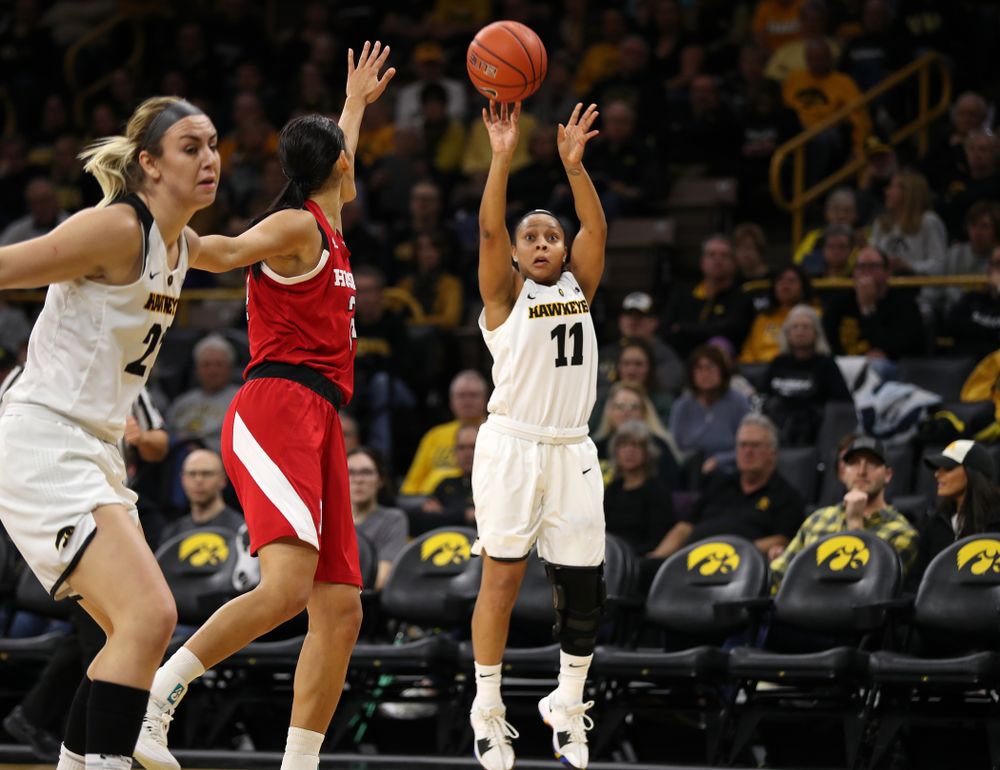 Iowa Hawkeyes guard Tania Davis (11) knocks down a three point basket against the Nebraska Cornhuskers Thursday, January 3, 2019 at Carver-Hawkeye Arena. (Brian Ray/hawkeyesports.com)