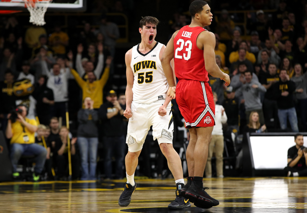 Iowa Hawkeyes forward Luka Garza (55) reacts after making a three point basket against the Ohio State Buckeyes Saturday, January 12, 2019 at Carver-Hawkeye Arena. (Brian Ray/hawkeyesports.com)