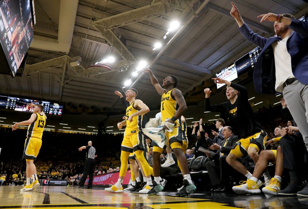 The Iowa Hawkeyes bench celebrates against the Nebraska Cornhuskers Saturday, February 8, 2020 at Carver-Hawkeye Arena. (Brian Ray/hawkeyesports.com)