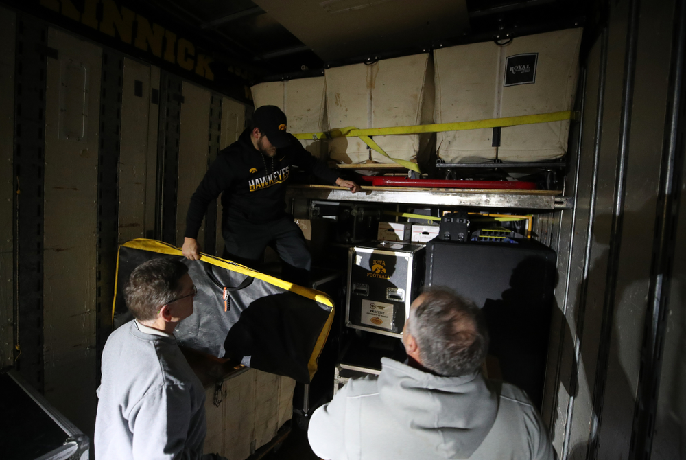 Members fo the Hawkeye Football equipment staff and managers load equipment onto the truck bound for Tampa for the Outback Bowl Wednesday, December 19, 2018 at the Hansen Football Performance Center. (Brian Ray/hawkeyesports.com)
