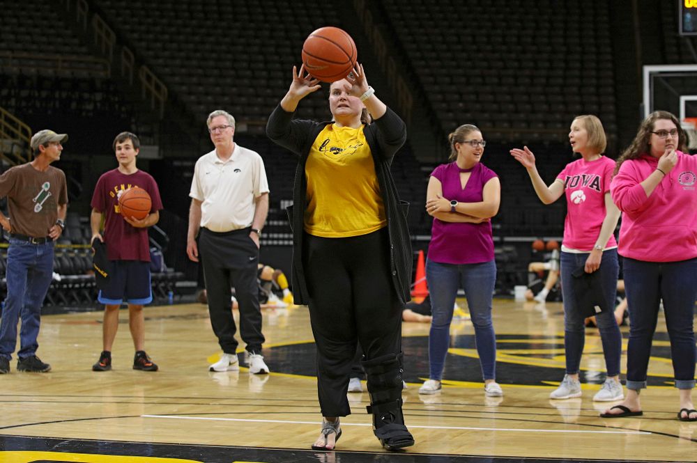 University of Iowa Hospitals and Clinics Adolescent and Young Adult (AYA) Cancer Program shoot baskets at Carver-Hawkeye Arena in Iowa City on Monday, Sep 30, 2019. (Stephen Mally/hawkeyesports.com)