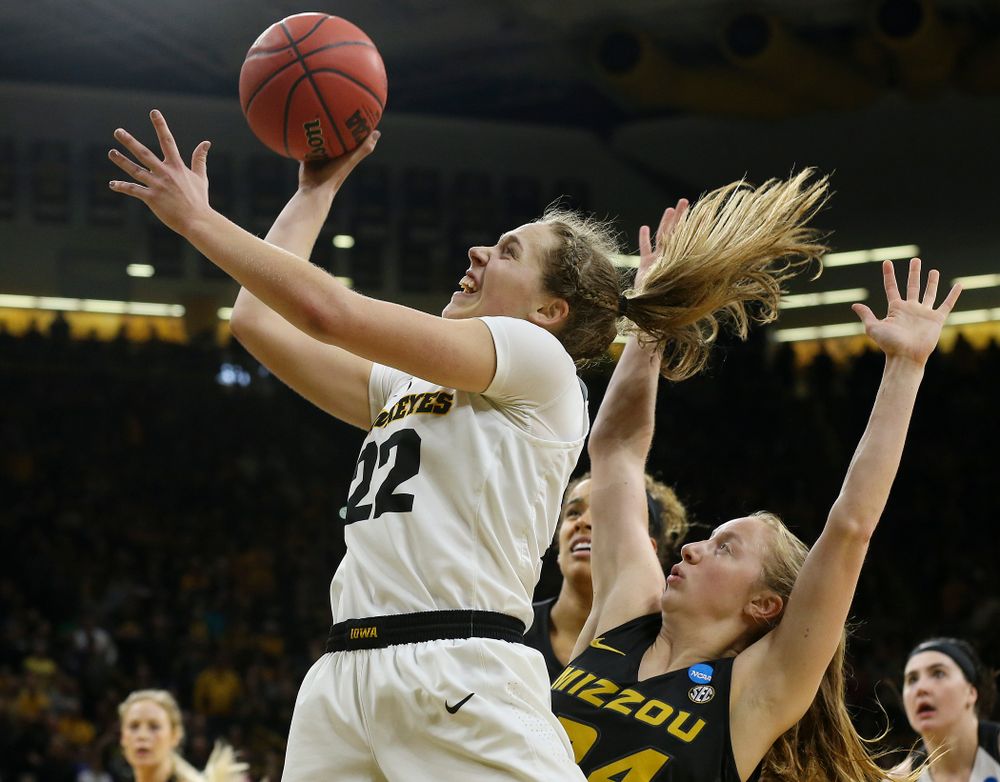 Iowa Hawkeyes guard Kathleen Doyle (22) scores a basket during the fourth quarter of their second round game in the 2019 NCAA Women's Basketball Tournament at Carver Hawkeye Arena in Iowa City on Sunday, Mar. 24, 2019. (Stephen Mally for hawkeyesports.com)