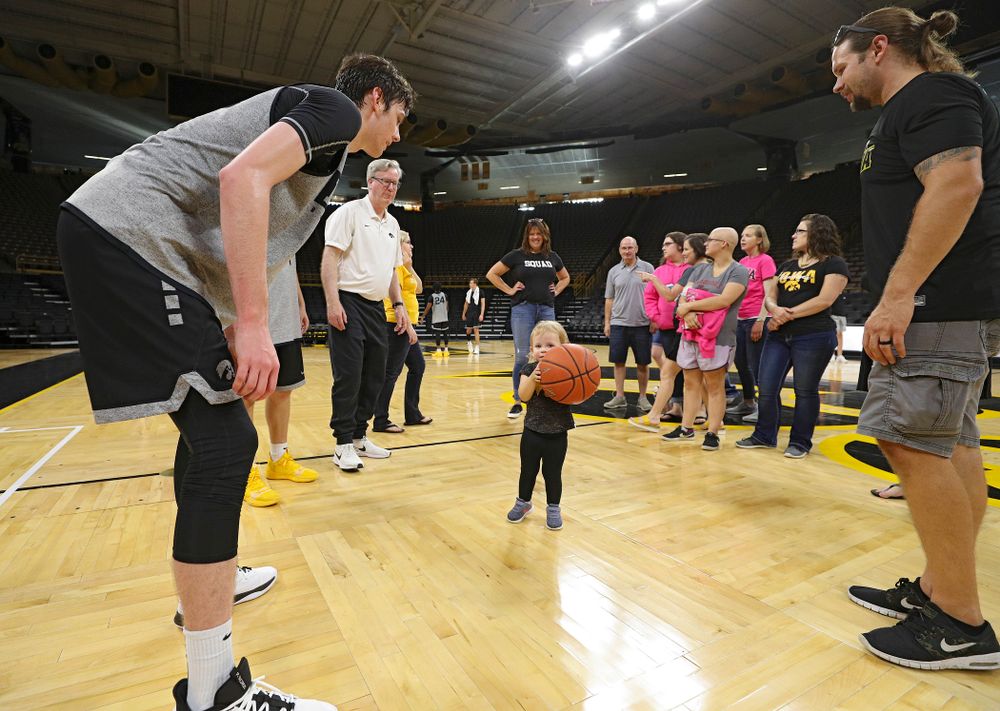 Iowa Hawkeyes forward Patrick McCaffery (22) talks with visitors from the University of Iowa Hospitals and Clinics Adolescent and Young Adult (AYA) Cancer Program after practice at Carver-Hawkeye Arena in Iowa City on Monday, Sep 30, 2019. (Stephen Mally/hawkeyesports.com)