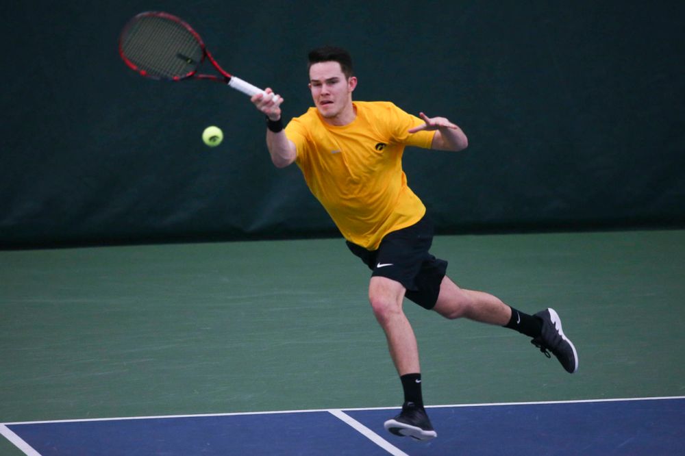 Iowa's Jonas Larsen at a tennis match vs Drake Friday, March 8, 2019 at the Hawkeye Tennis and Recreation Complex. (Lily Smith/hawkeyesports.com)