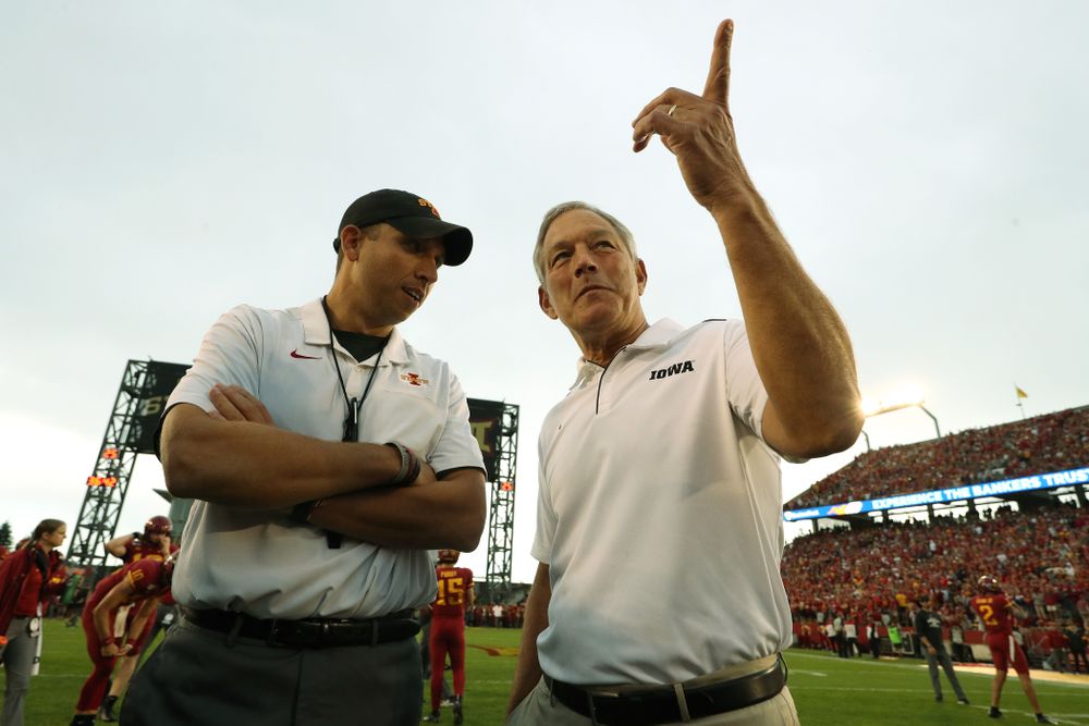 Iowa Hawkeyes head coach Kirk Ferentz talks with Iowa State Cyclones head coach Matt Campbell before their game Saturday, September 14, 2019 at Jack Trice Stadium in Ames, Iowa. (Brian Ray/hawkeyesports.com)