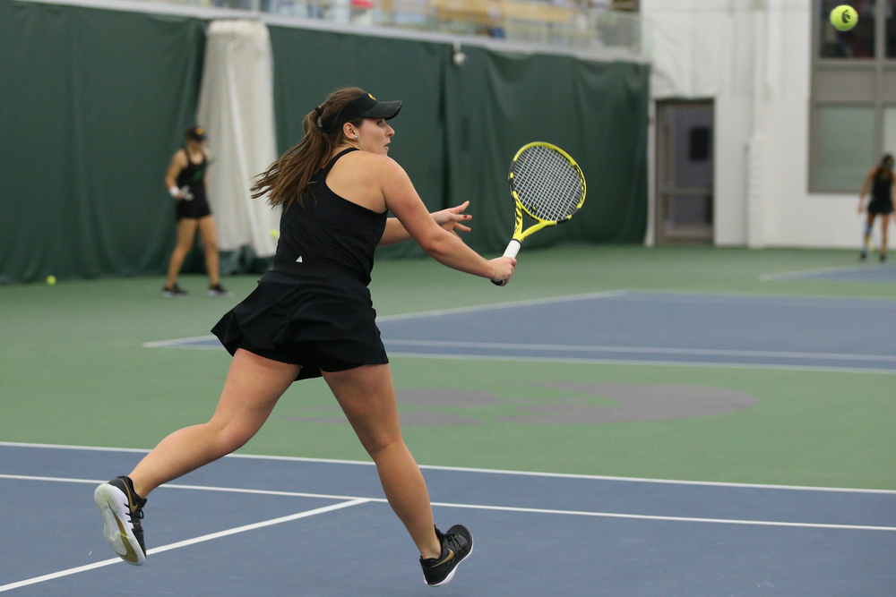 Iowa’s Danielle Bauers returns a hit during the Iowa women’s tennis meet vs UNI on Saturday, February 29, 2020 at the Hawkeye Tennis and Recreation Complex. (Lily Smith/hawkeyesports.com)