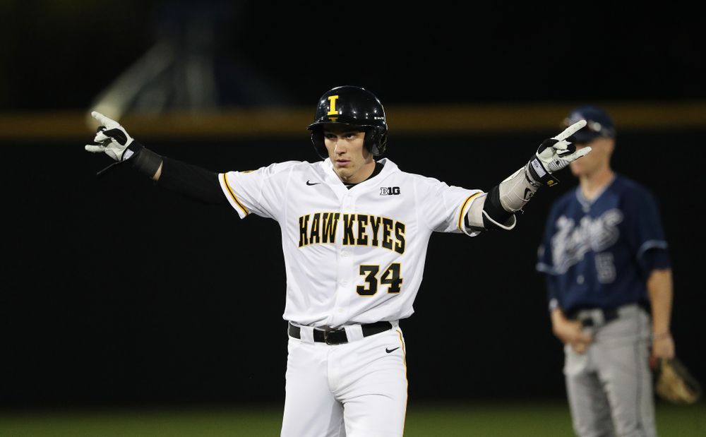 Iowa Hawkeyes catcher Austin Martin (34) doubles to drive in a run during game one against UC Irvine Friday, May 3, 2019 at Duane Banks Field. (Brian Ray/hawkeyesports.com)