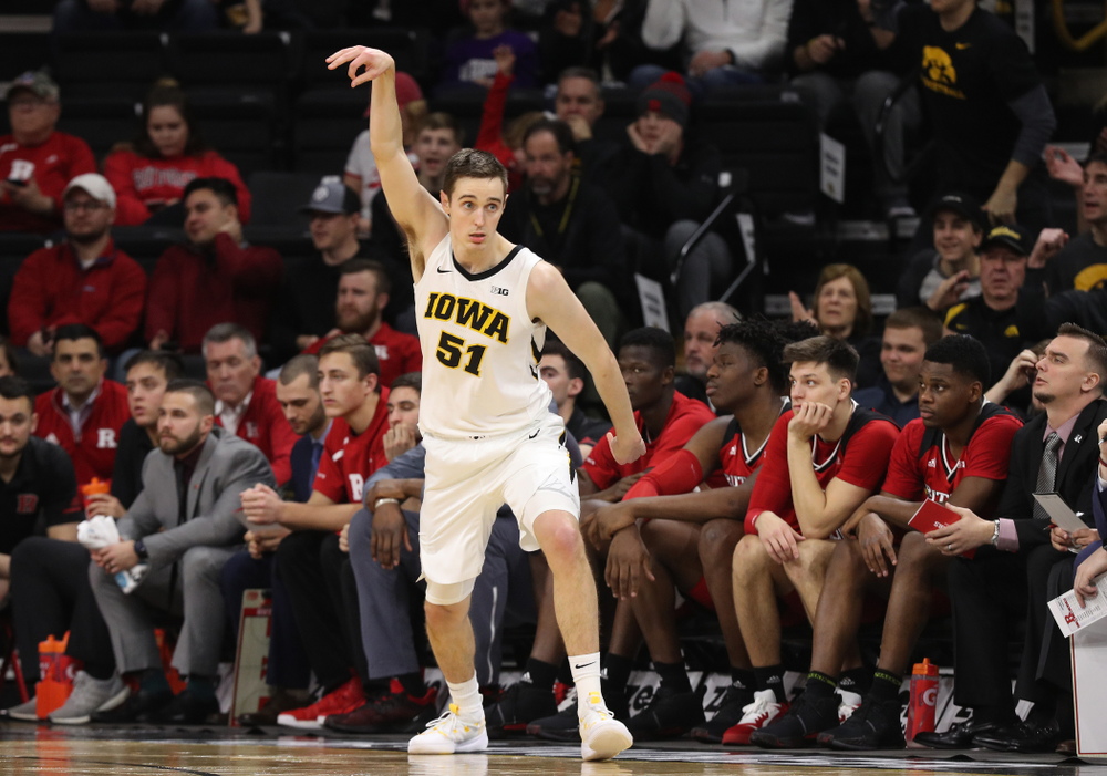 Iowa Hawkeyes forward Nicholas Baer (51) knocks down a three point basket against the Rutgers Scarlet Knights Saturday, March 2, 2019 at Carver-Hawkeye Arena. (Brian Ray/hawkeyesports.com)