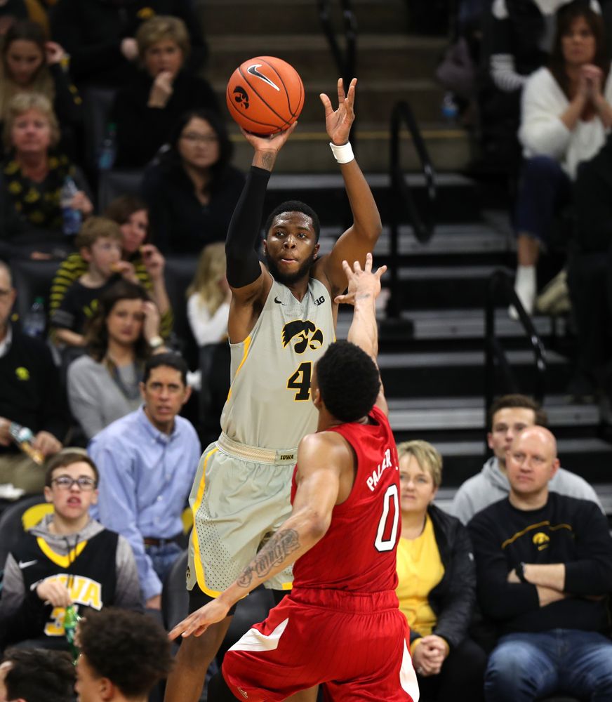 Iowa Hawkeyes guard Isaiah Moss (4) knocks down a three point basket against the Nebraska Cornhuskers Sunday, January 6, 2019 at Carver-Hawkeye Arena. (Brian Ray/hawkeyesports.com)