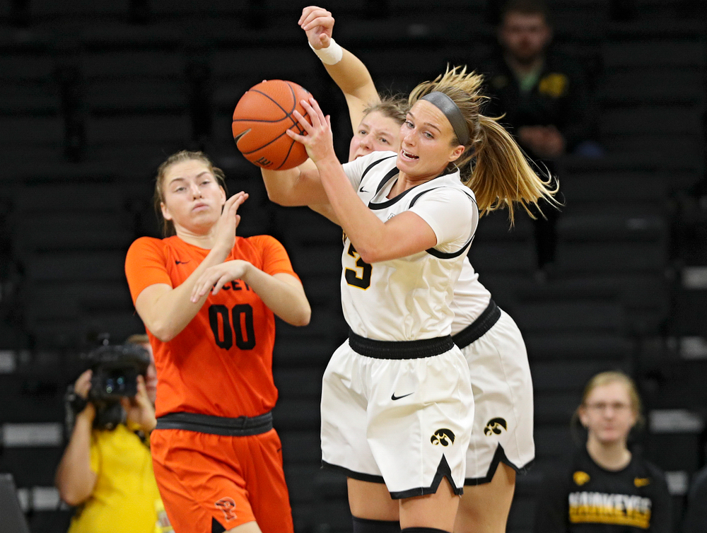 Iowa guard Makenzie Meyer (3) pulls down a rebound during the fourth quarter of their overtime win against Princeton at Carver-Hawkeye Arena in Iowa City on Wednesday, Nov 20, 2019. (Stephen Mally/hawkeyesports.com)