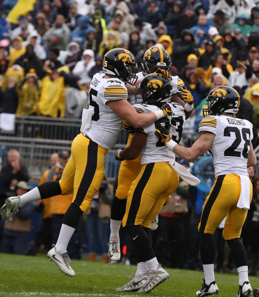 Iowa Hawkeyes wide receiver Dominique Dafney (23) blocks a punt against the Penn State Nittany Lions Saturday, October 27, 2018 at Beaver Stadium in University Park, Pa. (Brian Ray/hawkeyesports.com)