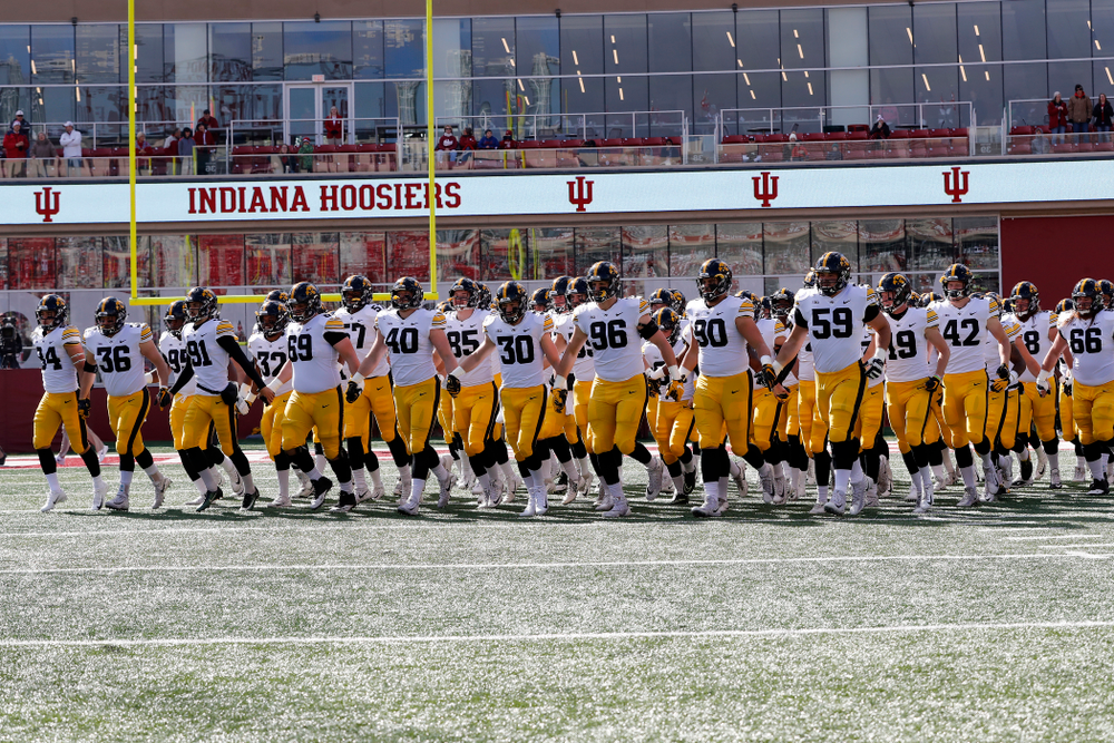 The Iowa Hawkeyes swarm out for their game against the Indiana Hoosiers Saturday, October 13, 2018 at Memorial Stadium, in Bloomington, Ind. (Max Allen/hawkeyesports.com)