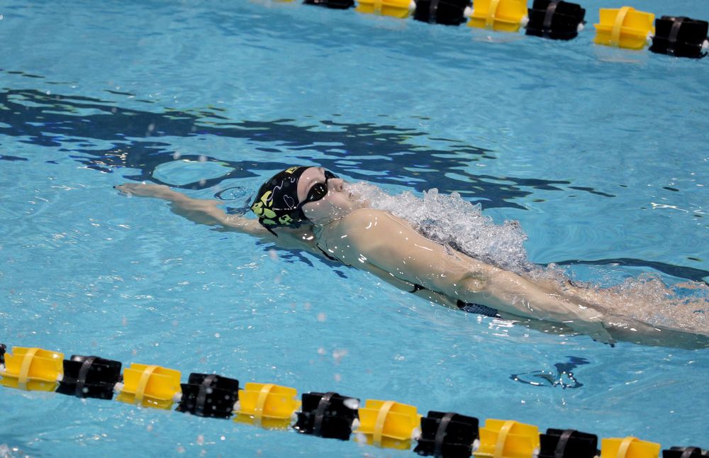 IowaÕs Emilia Sansome competes in the 100 yard backstroke against Notre Dame and Illinois Saturday, January 11, 2020 at the Campus Recreation and Wellness Center. (Brian Ray/hawkeyesports.com)