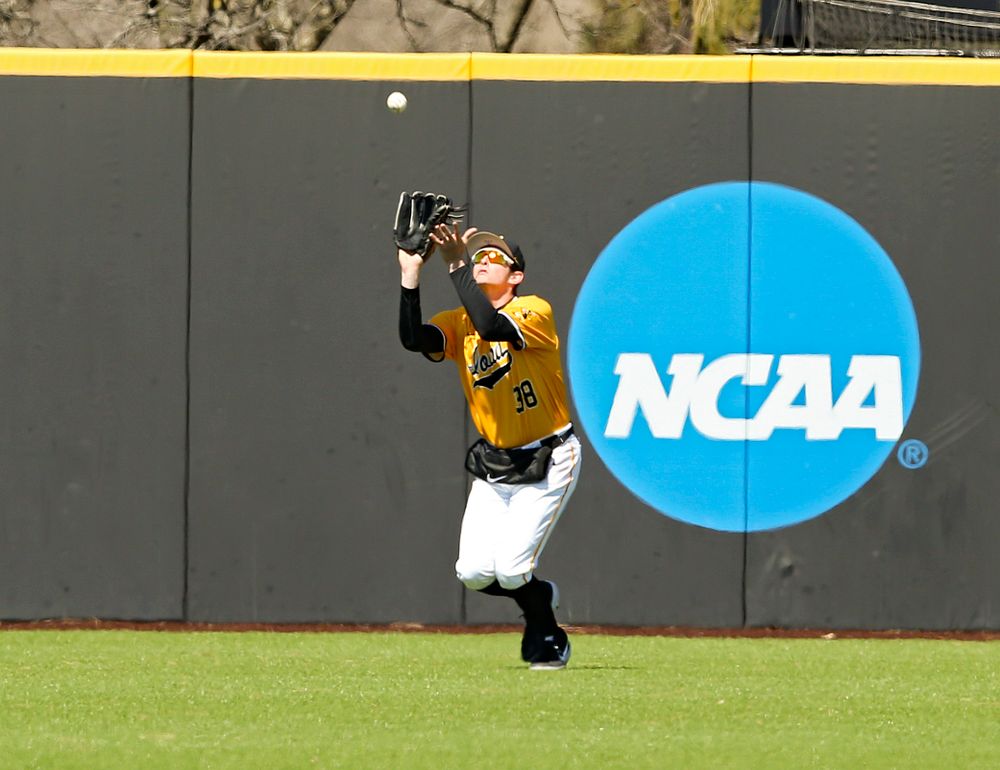 Iowa Hawkeyes left fielder Trenton Wallace (38) pulls in a fly ball for an out during the first inning against Illinois at Duane Banks Field in Iowa City on Sunday, Mar. 31, 2019. (Stephen Mally/hawkeyesports.com)