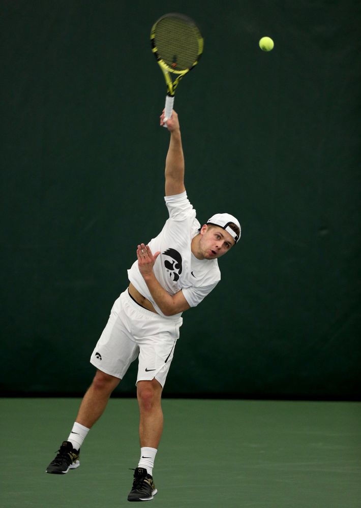 Iowa’s Will Davies against Cornell Sunday, March 8, 2020 at the Hawkeye Tennis and Recreation Center. (Brian Ray/hawkeyesports.com)