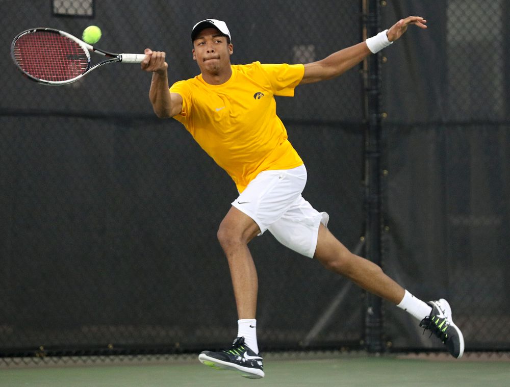 Iowa's Oliver Okonkwo during his match again Michigan State at the Hawkeye Tennis and Recreation Complex in Iowa City on Friday, Apr. 19, 2019. (Stephen Mally/hawkeyesports.com)