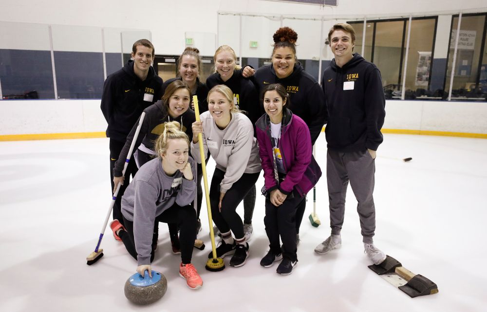 Members of the Iowa Softball team learn the sport of curling as part of a team building event Wednesday, January 10, 2018 at the Cedar Rapids Ice Arena. (Brian Ray/hawkeyesports.com)