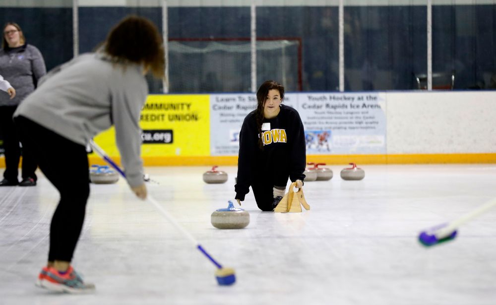 Members of the Iowa Softball team learn the sport of curling as part of a team building event Wednesday, January 10, 2018 at the Cedar Rapids Ice Arena. (Brian Ray/hawkeyesports.com)