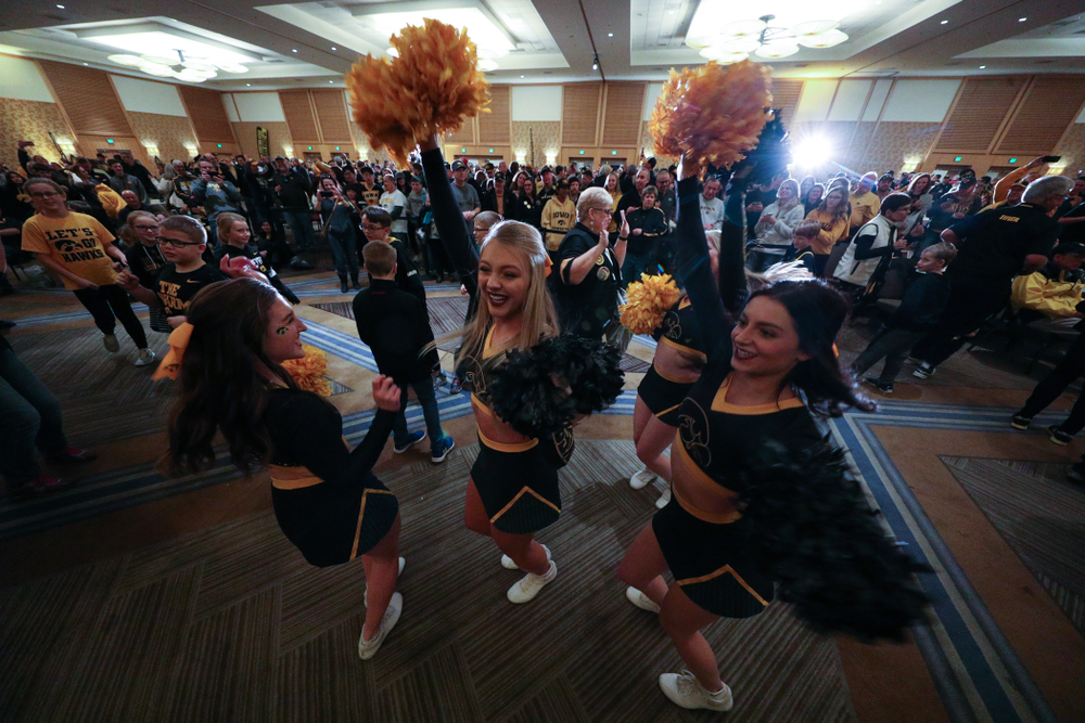 Fans dance to the Hokey Pokey in honor of the late Hayden Fry during the Holiday Bowl Hawkeye Huddle Thursday, December 26, 2019 at the Hilton in downtown San Diego. (Brian Ray/hawkeyesports.com)