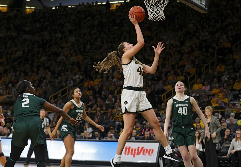 Iowa Hawkeyes forward Amanda Ollinger (43) makes a basket during the third quarter of their game at Carver-Hawkeye Arena in Iowa City on Sunday, January 26, 2020. (Stephen Mally/hawkeyesports.com)