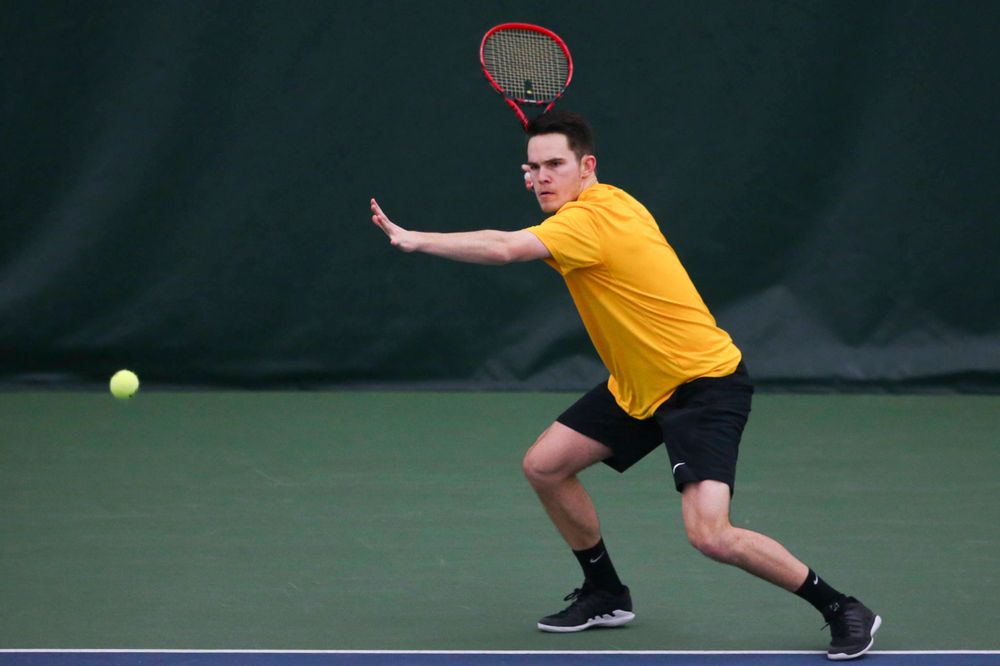 Iowa's Jonas Larsen at a tennis match vs Drake Friday, March 8, 2019 at the Hawkeye Tennis and Recreation Complex. (Lily Smith/hawkeyesports.com)
