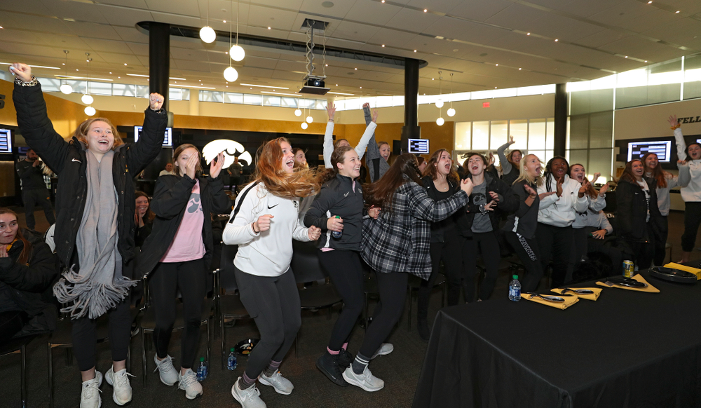 The Iowa Soccer team reacts after hearing their team called on the NCAA women’s soccer section show at Carver-Hawkeye Arena in Iowa City on Monday, Nov 11, 2019. (Stephen Mally/hawkeyesports.com)