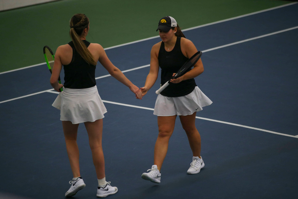 IowaÕs Danielle Bauers (left) at womenÕs tennis senior day vs Nebraska on Saturday, April 13, 2019 at the Hawkeye Tennis and Recreation Complex. (Lily Smith/hawkeyesports.com)