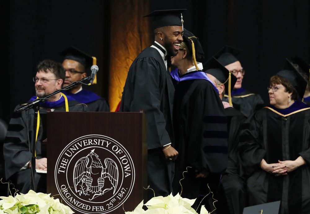 Iowa Track's Christian Brissett during the Fall Commencement Ceremony Saturday, December 15, 2018 at Carver-Hawkeye Arena. (Brian Ray/hawkeyesports.com)