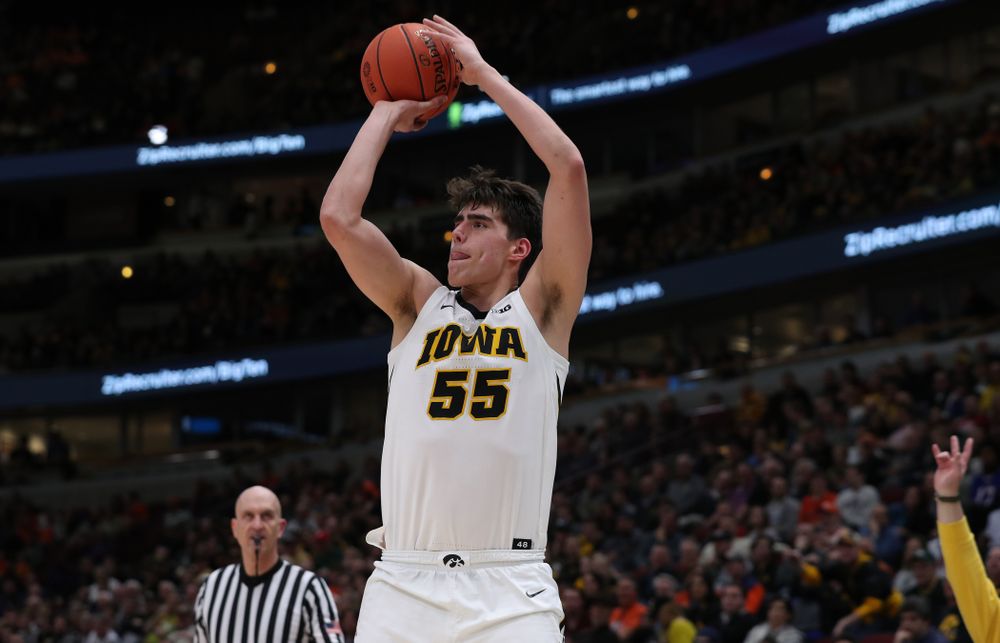 Iowa Hawkeyes forward Luka Garza (55) against the Illinois Fighting Illini in the 2019 Big Ten Men's Basketball Tournament Thursday, March 14, 2019 at the United Center in Chicago. (Brian Ray/hawkeyesports.com)