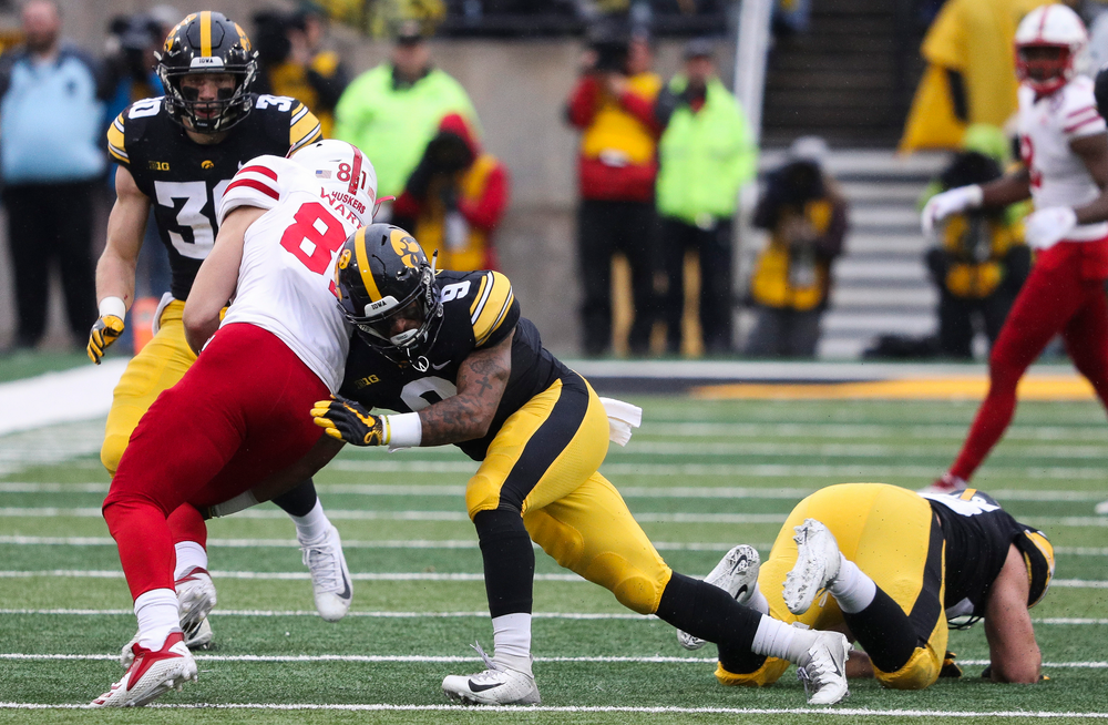 Iowa Hawkeyes defensive back Geno Stone (9) makes a tackle during a game against Nebraska at Kinnick Stadium on November 23, 2018. (Tork Mason/hawkeyesports.com)