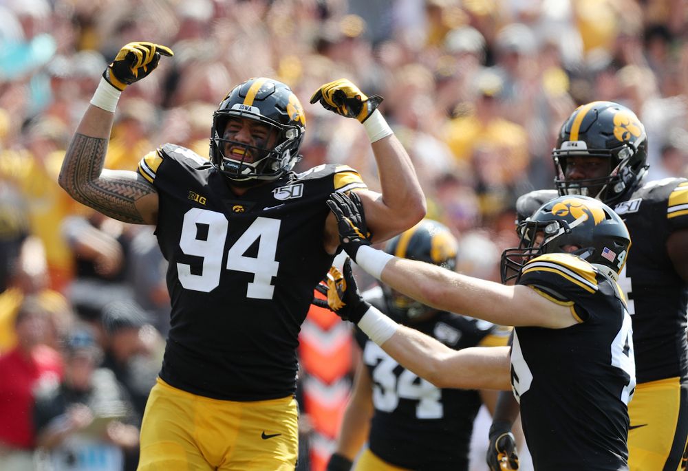 Iowa Hawkeyes defensive end A.J. Epenesa (94) celebrates a sack against the Rutgers Scarlet Knights Saturday, September 7, 2019 at Kinnick Stadium. (Brian Ray/hawkeyesports.com)