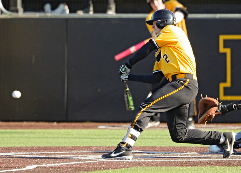 Iowa Hawkeyes shortstop Brendan Sher (2) drives a pitch for a hit during the fourth inning of their game at Duane Banks Field in Iowa City on Tuesday, Apr. 2, 2019. (Stephen Mally/hawkeyesports.com)
