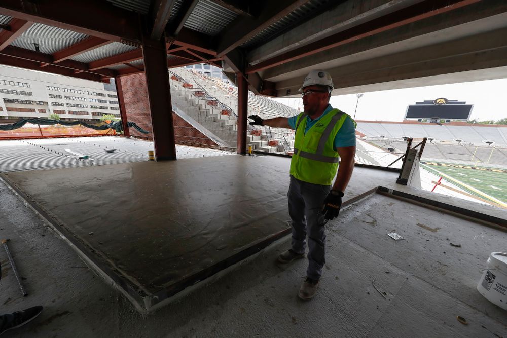 University of Iowa Senior Construction Project Manager Michael Kearns talks about the outdoor patio area in the northeast cover of the north end zone Wednesday, June 6, 2018 at Kinnick Stadium. (Brian Ray/hawkeyesports.com)